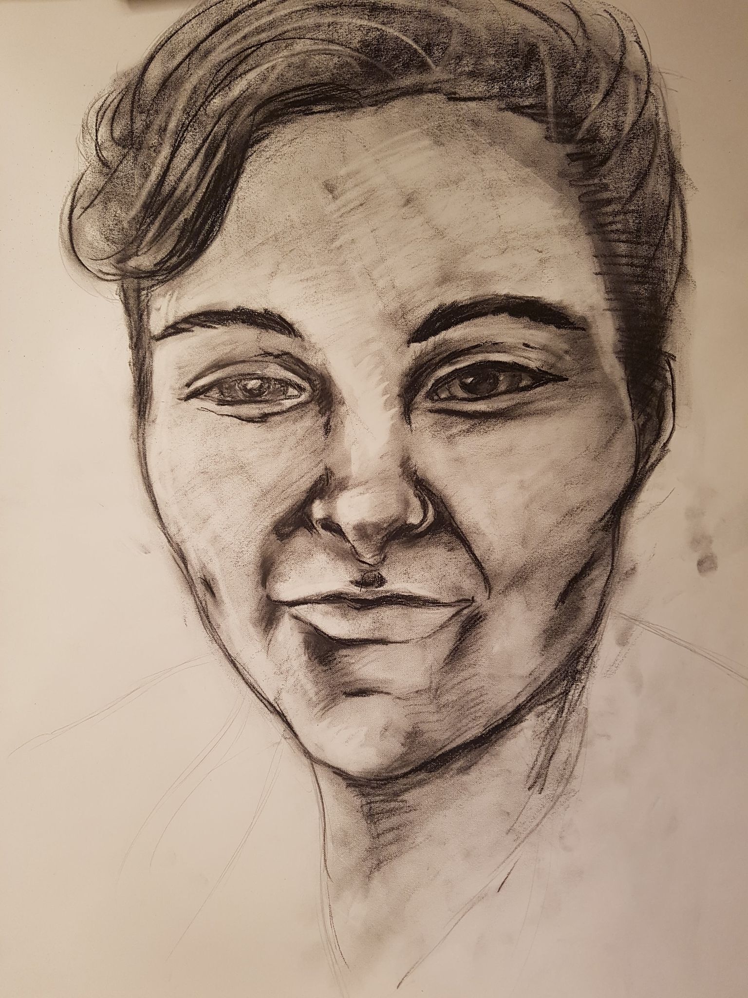 large charcoal portrait.